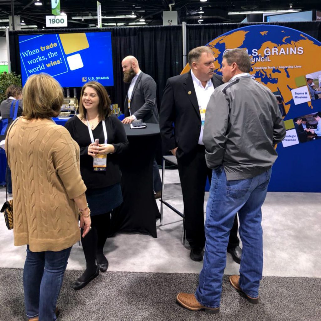 People gathered at the USGC booth at Commodity Classic