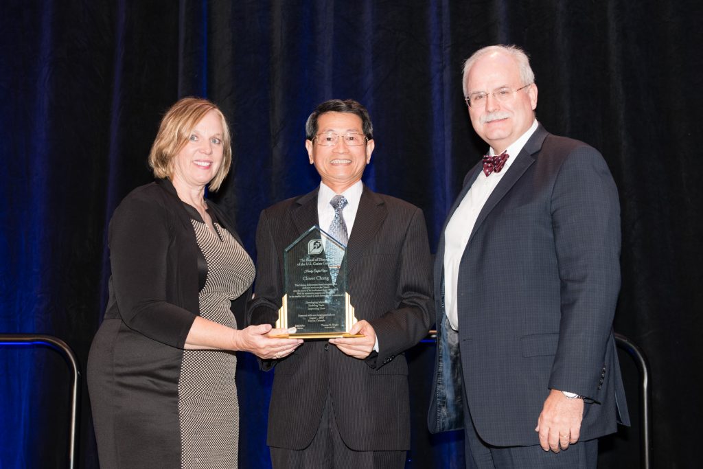 image of Clover Chang receiving an Award