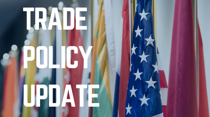 Trade Policy Update Next to National Flags graphic