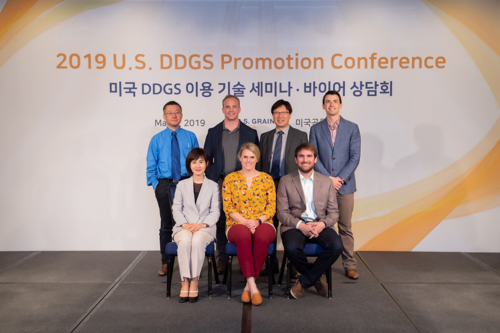 Seoul DDGS Conference- group photo of attendees in front of conference banner