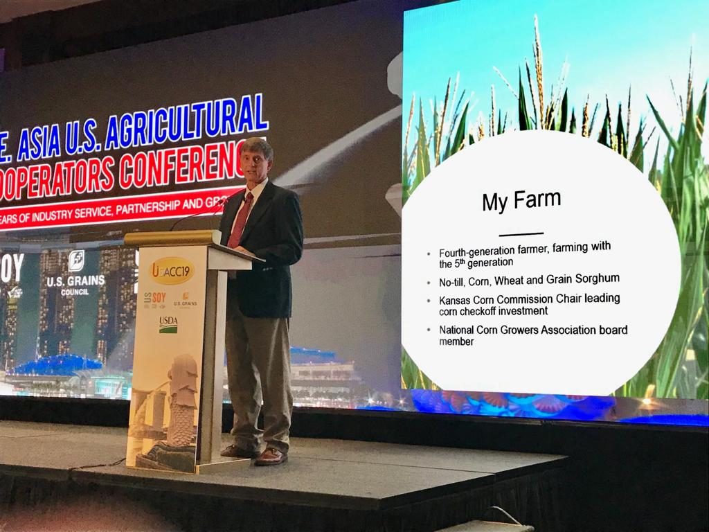 Southeast Asia Conference- man standing at a podium on stage speaking