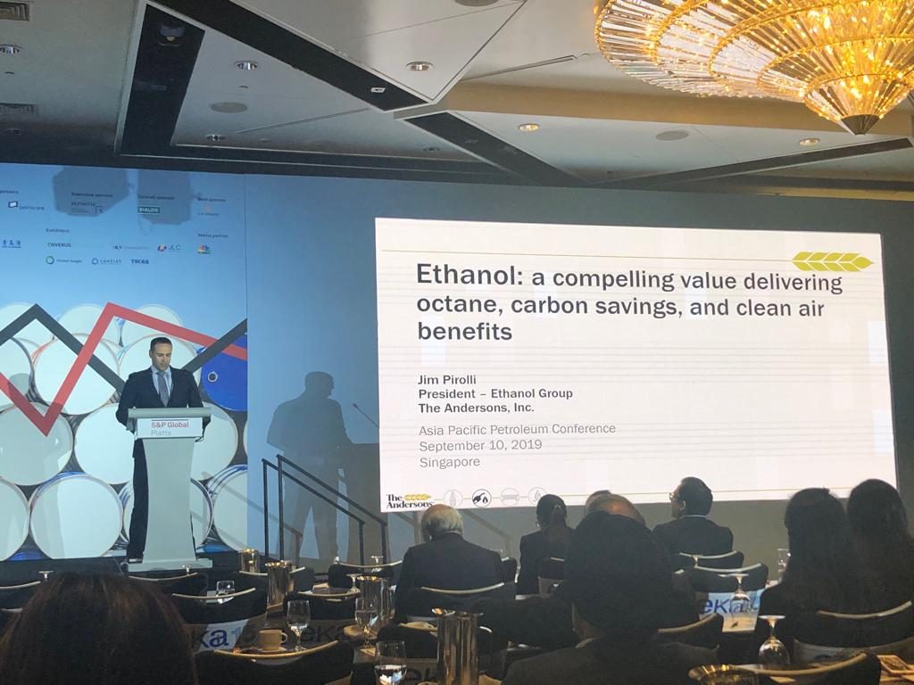 Ethanol at APPEC- man standing at podium on the stage presenting information regarding ethanol