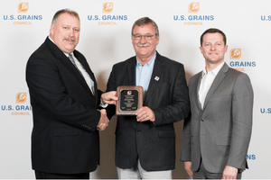 Image of a man receiving an award