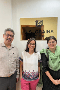 image of a man and two women smiling for a photo