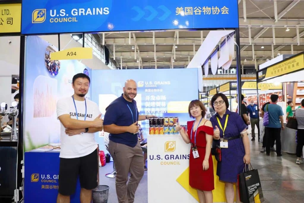 image of four people at a trade show booth