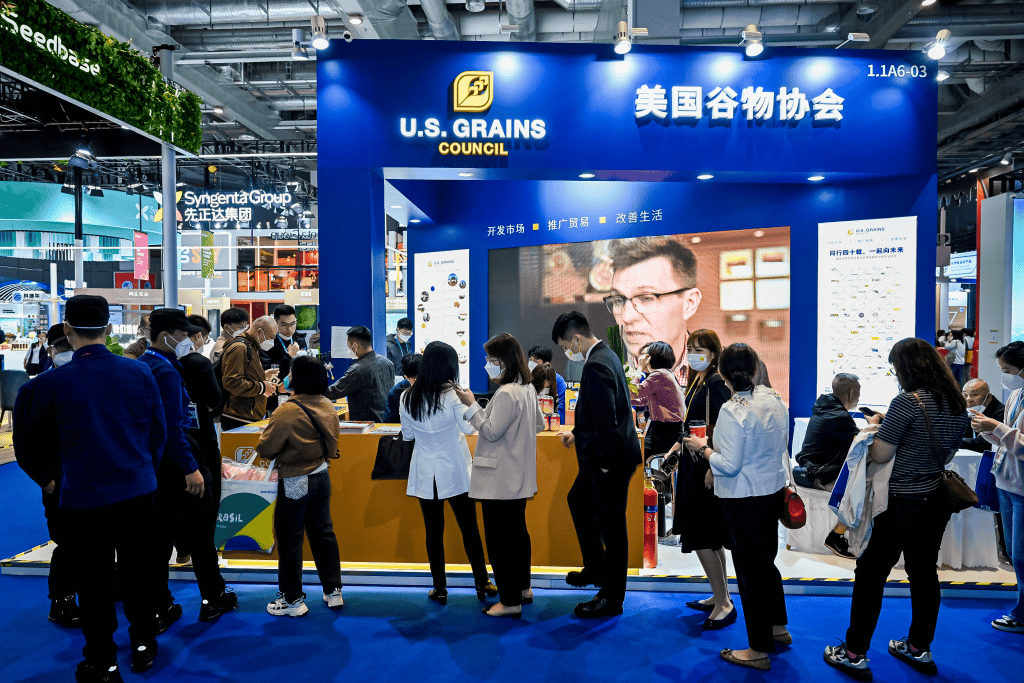 image of people at a trade show booth in China