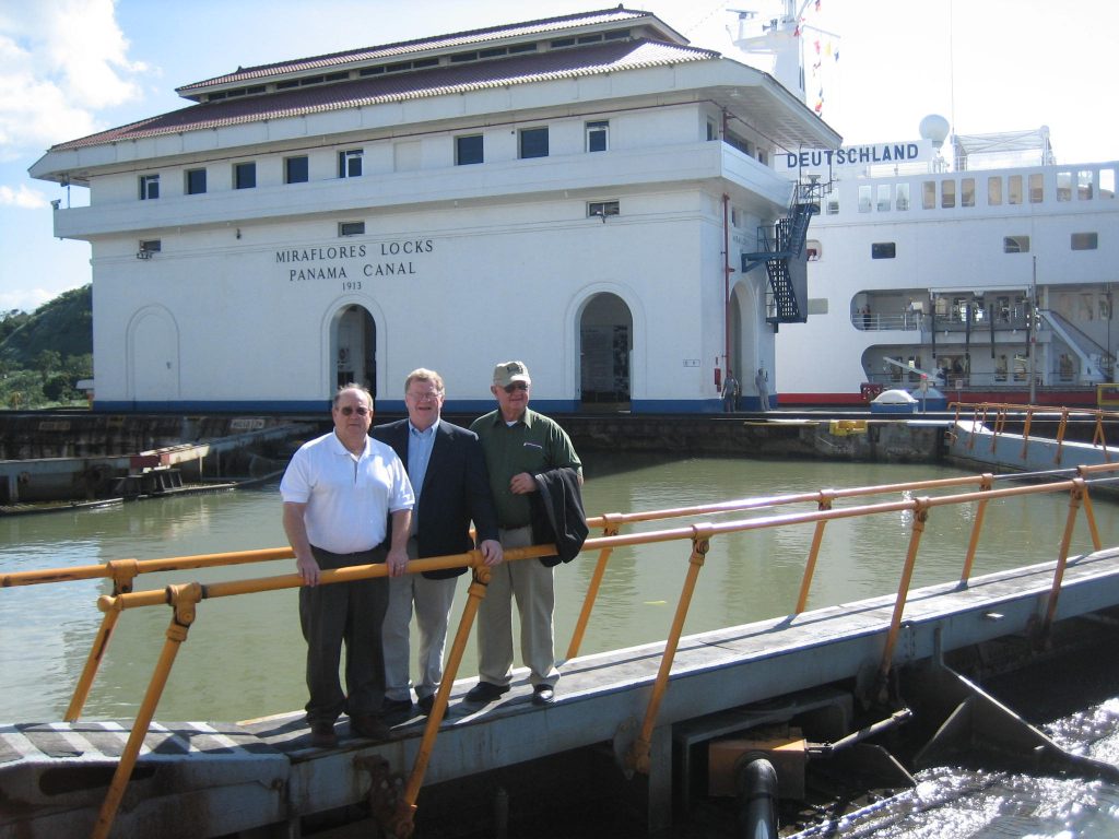image of three men at the Panama Canal