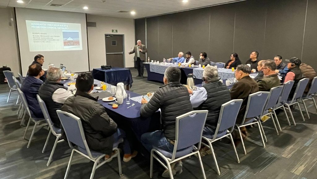 image of man speaking to a room of people