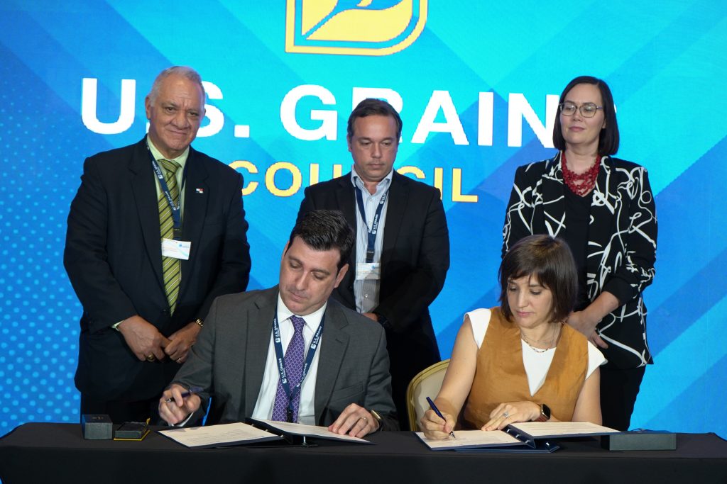 image of people signing an MOU