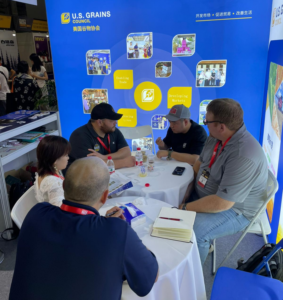 image of people in discussion at a trade show
