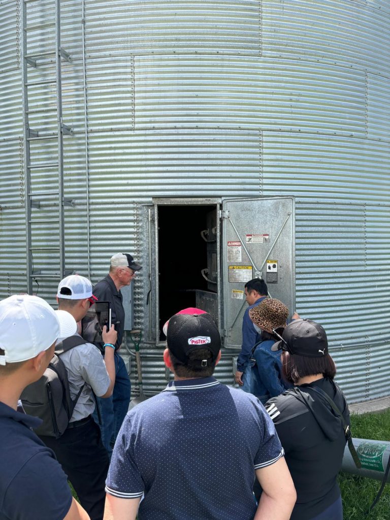 A group of people looking into a silo