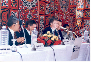 A panel of speakers at a press conference 