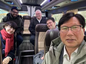 A selfie of people sitting in a van